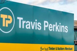 Travis Perkins profits plunge