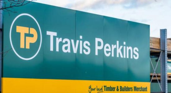 Travis Perkins profits plunge